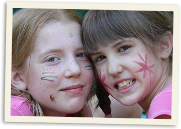 Happy girls with painted faces