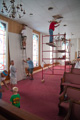 Mission team raplacing drywall in the sanctuary